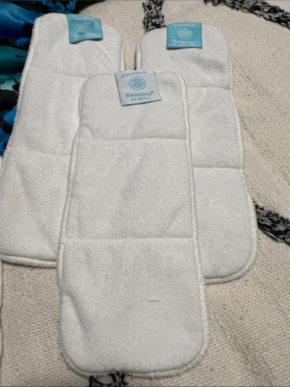 Two Nicki’s One Size Snap Pocket Diapers with 5 Inserts (3 are Charlie Banana)